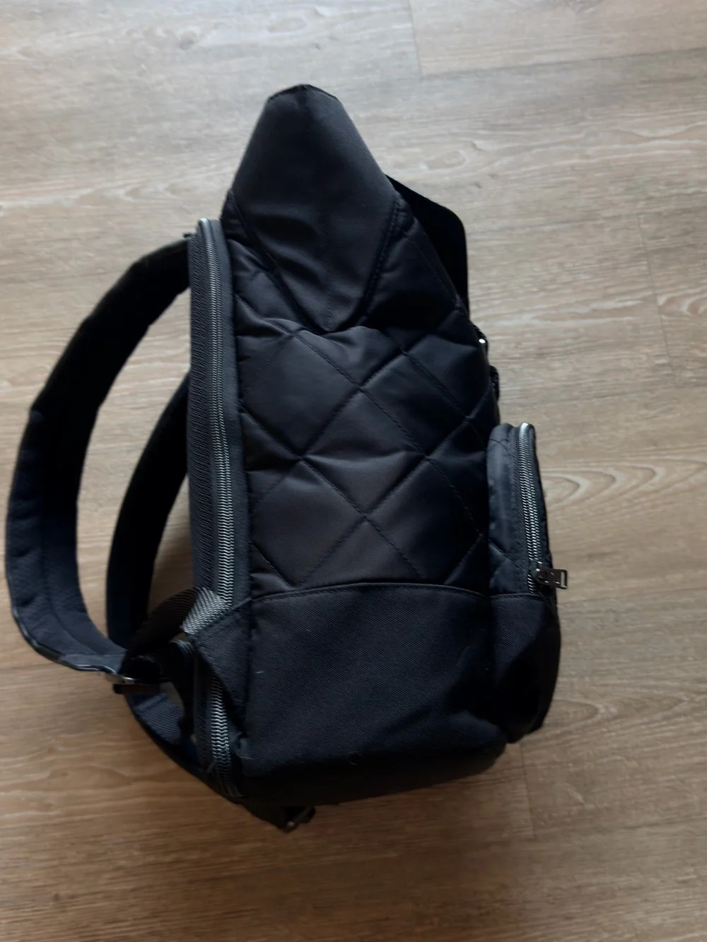 Black Quilted Roll-Top Backpack - [Brand]